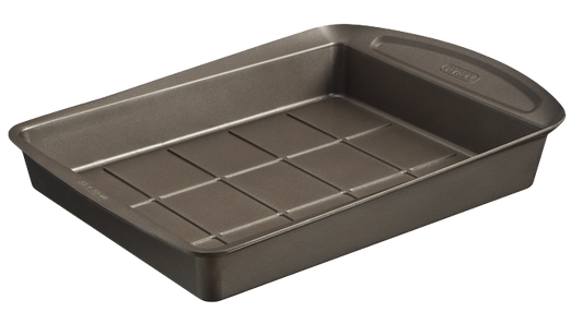 Rectangular non-stick metal brownie pan with large handles for easy handling.