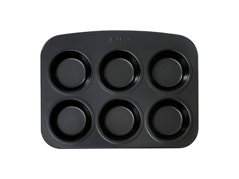 6-cup metal muffin tin with non-stick coating and a large handle for easy handling, seen from above.