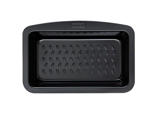 Metal cake tin with black non-stick coating and a large handle for easy grip, seen from above.