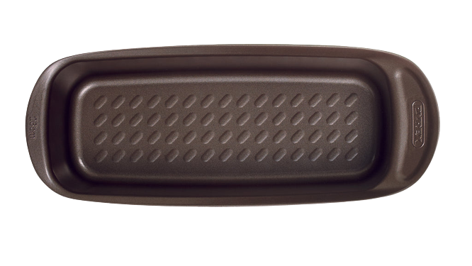 Non-stick metal cake tin with large handles for easy grip, viewed from above.