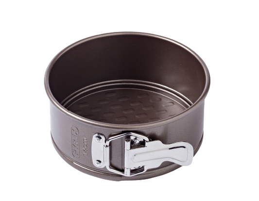 Round springform pan in non-stick metal.