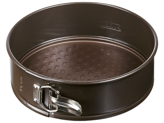 Round springform pan in non-stick metal.